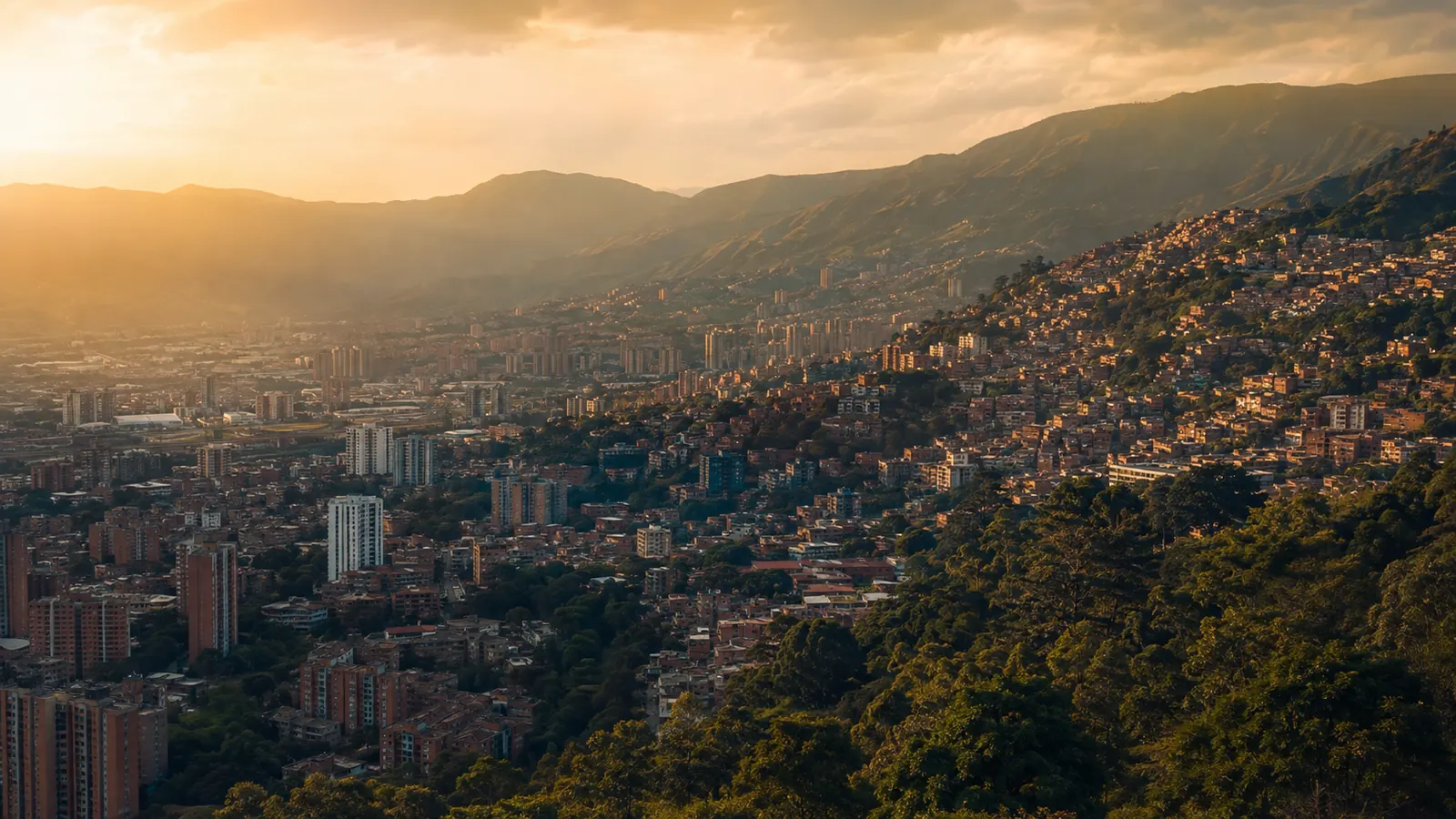 Medellín spread through the Aburrá valley at sunset
